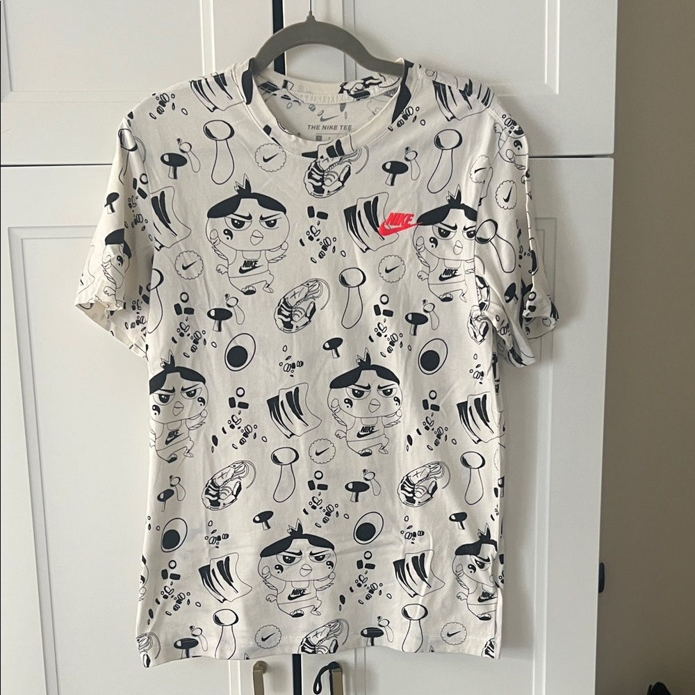 Nike Cream T-Shirt with Black and Red Graphics